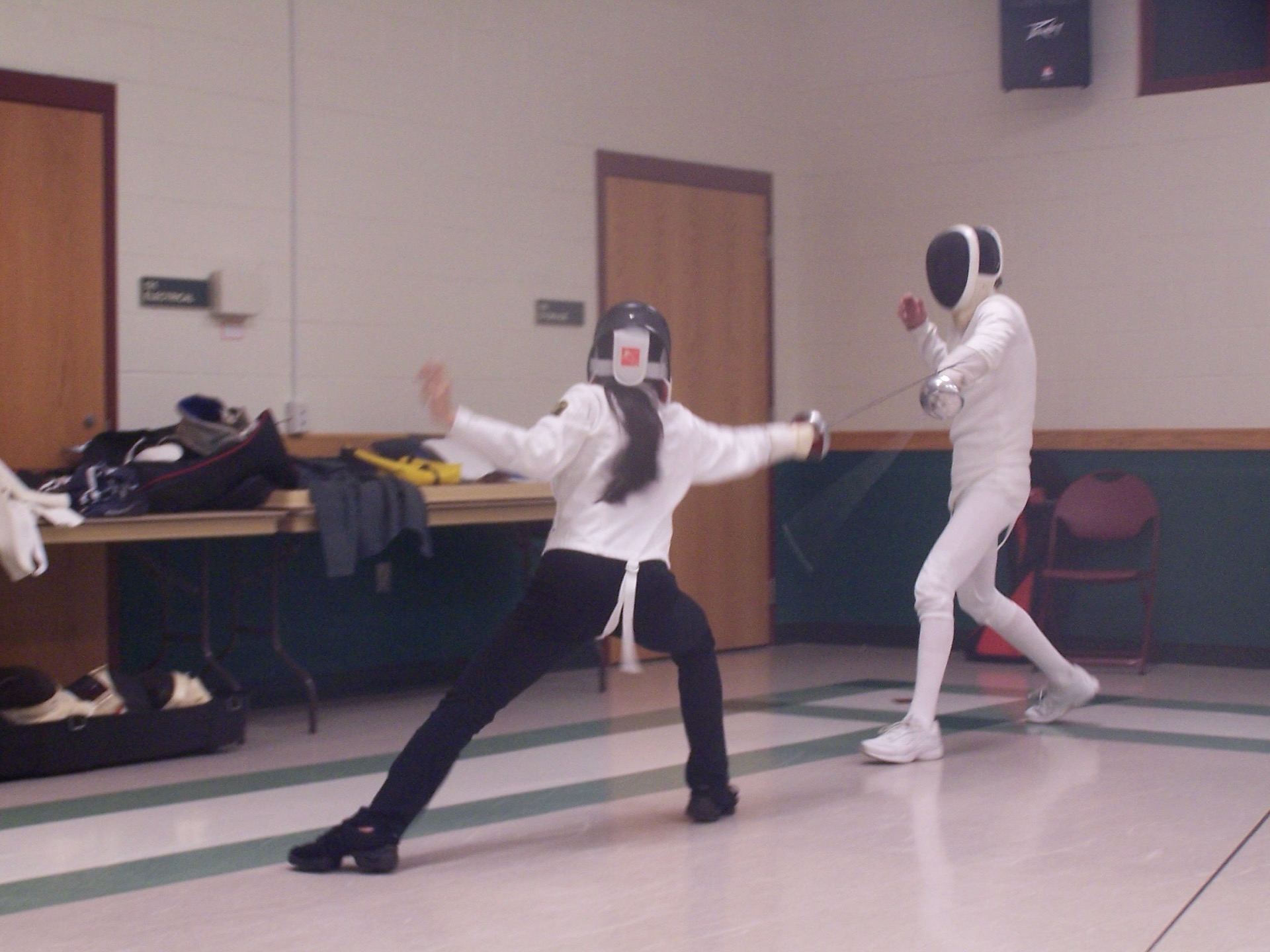 Fencers in action