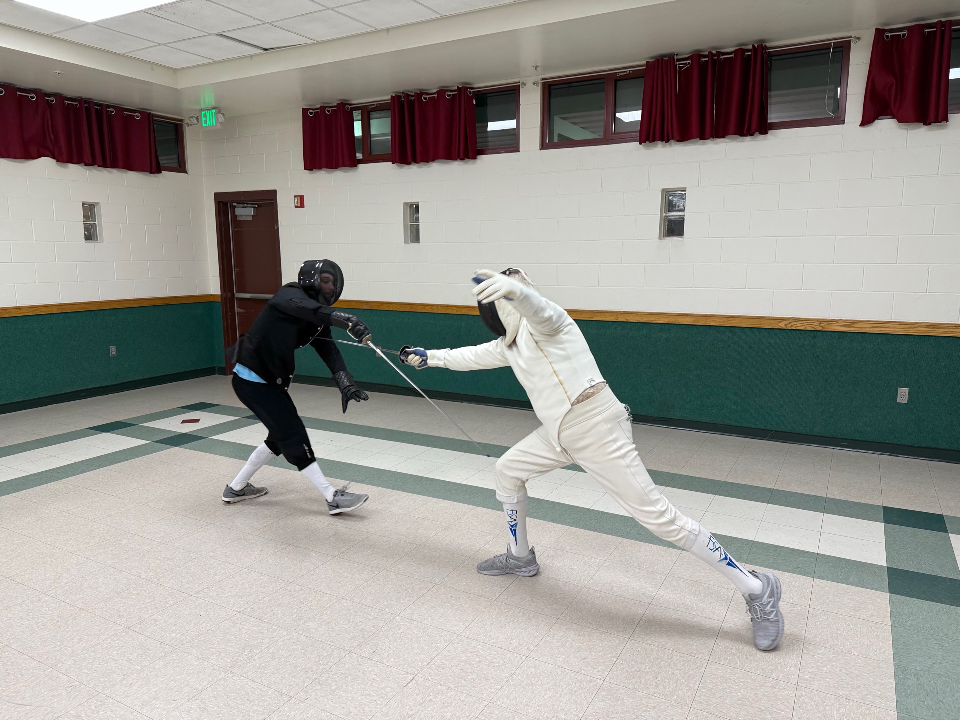 Fencers in action